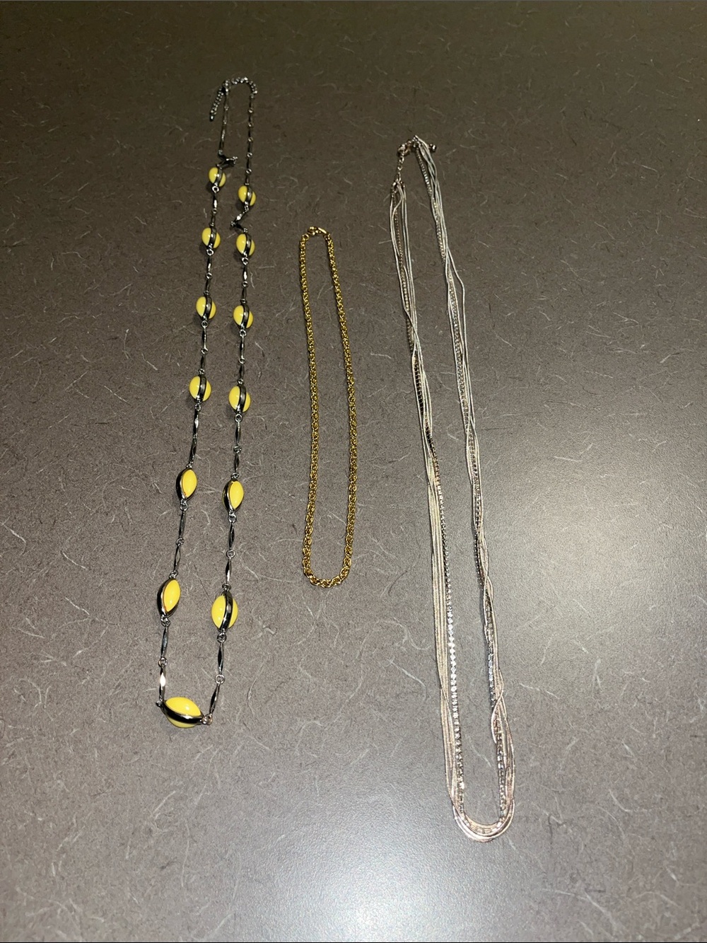 Misc Necklaces-gold tone chain, yellow enamel & silvertone and multi strand